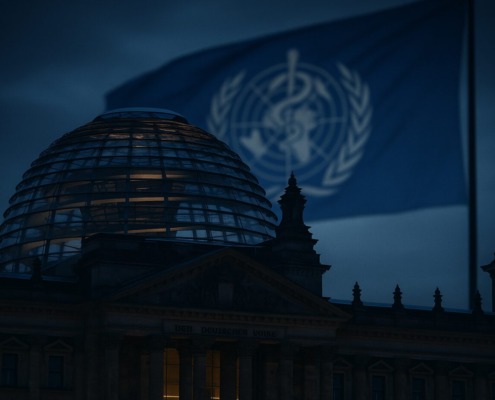 Bundestagskuppel, dahinter WHO Flagge